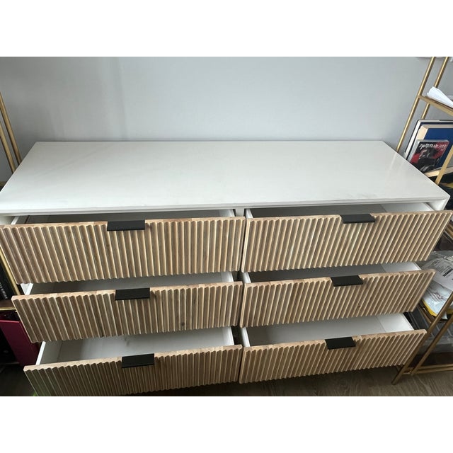 West Elm Quinn Dresser, bought new two years ago. Minimal wear and sturdy construction. 71.5"w x 18"d x 34”h. We love this...