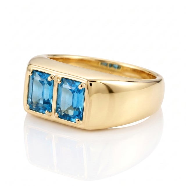 Add a refreshing splash of vibrant blue to your jewelry rotation with this bold, smooth signet ring designed with two...