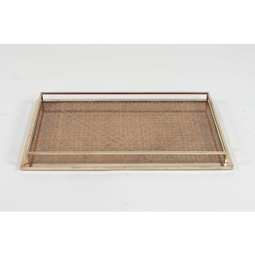 Midcentury amazing rectangular serving tray or centerpiece in acrylic, rattan and brass in the style of Christian Dior...