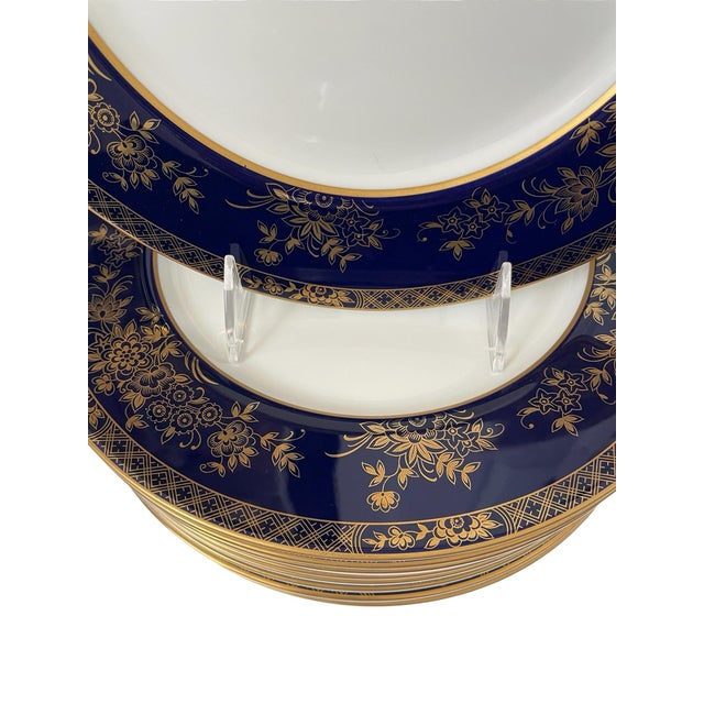 The Mikasa Bone China Buckingham A6 002 set includes ten dinner plates made in Narumi, Japan. These round plates feature a...