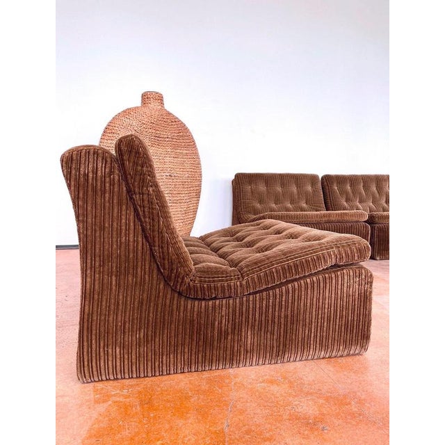 DUX International modular seating group consisting of 7 individual elements in a pleasant and soft corduroy velvet fabric....