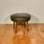 Authentic 1950s, all original Mid-Century Modern footstool in durable pebble-grain textured vinyl (or Naugahyde) olive...
