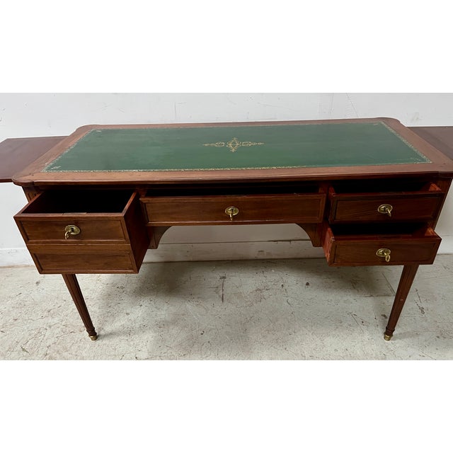 Louis xvi style flat desk in mahogany and veneer four tapered legs with recessed fluting four drawers in the front and two...