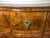 Mid-18th century high gloss Rococo walnut serpentine front, gilt bronze mounted three-drawer chest with bracket feet,...