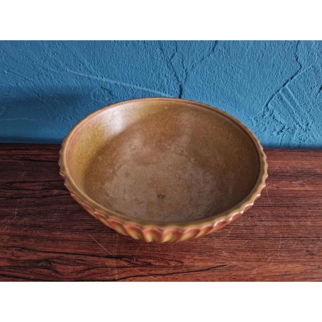 Christian Poulsen (1911-1991) for Bing & Grøndahl 'B & G'. Very rare shell in ribbed optics made of earthenware. Beautiful...