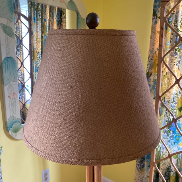 Listing is for a vintage bent bamboo with rattan binding floor lamp with burlap shade and finial. With included natural...