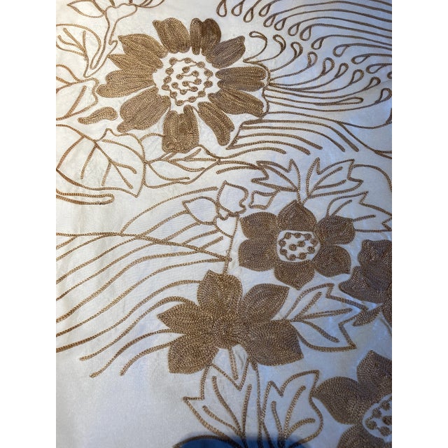 A perfect decorative accent piece to a dining table. The floral embroidery is inspired by naive folk floral theme with a...