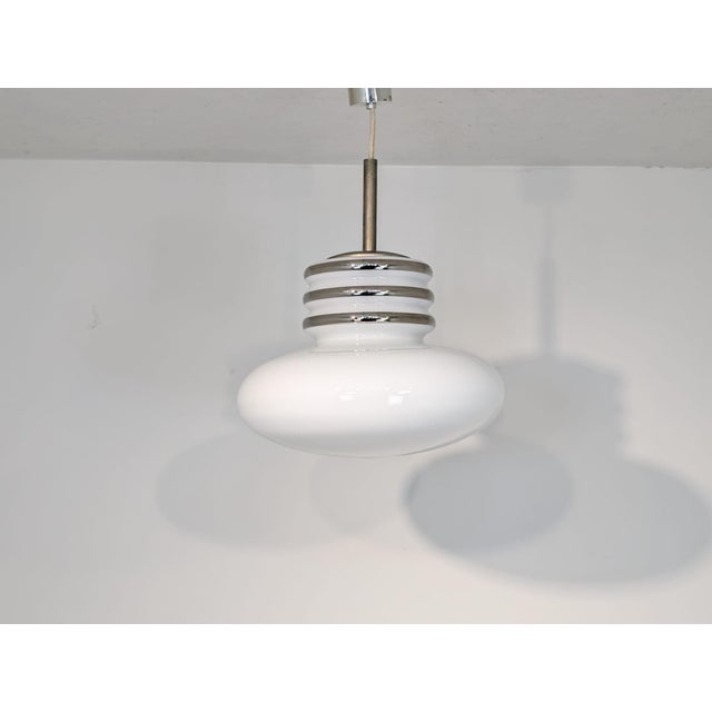 Opal Glass Pendant Lamp by Peill & Putzler, 1960s, in Very Good conditions. Designed 1960 to 1969 This piece is designed...