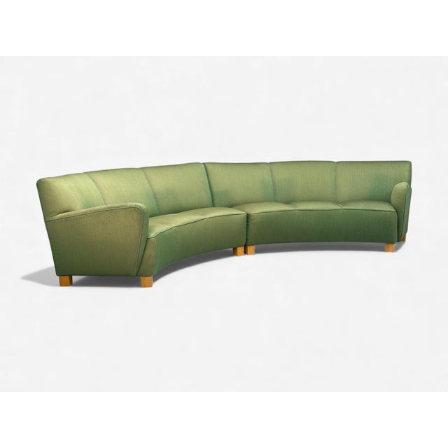 Danish Cabinetmaker, Mid-Century Modern, Green Fabric, Wood, Two Piece Banana Sofa, Denmark, 1960s A large two piece...