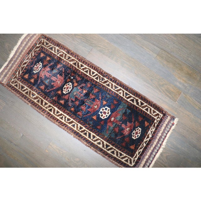 a tribal early 20th Century Balouch Mini Size Rug