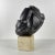 An extraordinary marble sculpture by Italian artist Pietro Cenedella, an abstract head-like form balancing between...