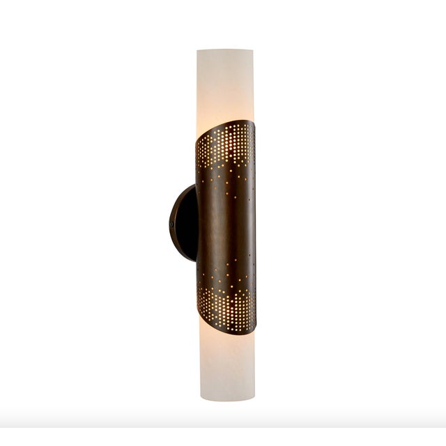 A softly rounded column of matte swirl glass is held by an English bronze-plated steel shield, perforated to let accents...