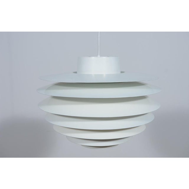 Verona lamp designed by Svend Middelboe in 1962 and manufactured by Fog & Mørup. It is made of white enameled aluminum...