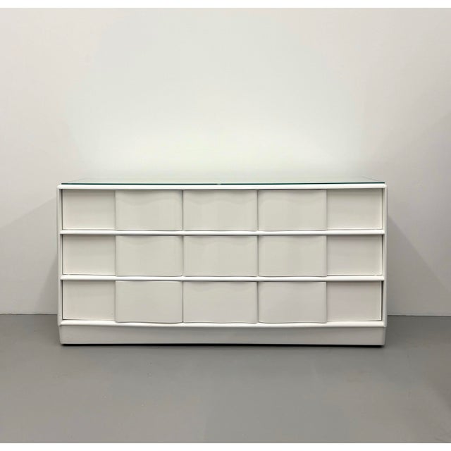 A striking vintage Heywood-Wakefield dresser featuring a clean-lined postmodern silhouette with 6 spacious drawers...
