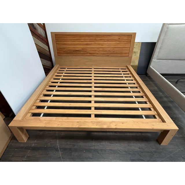 Design Plus Gallery presents the Eastern King Size Sierra Bed Frame from Crate & Barrel. This wood bed frame showcases a...