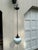 Old Lights On is pleased to offer this dark brass hanging fixture with vintage hanging glass blue and white globe. It is...