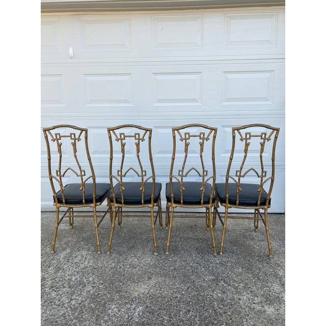 1960s Faux Bamboo SixPiece Cast Iron Glass Top Table and Chairs