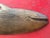 Wood carved plaque of a baleen whale carved in pine by the artist, naturalist, and marine expert Joe Yaiullo. Besides...