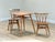 A charming and unusual mid-century Ercol dining set, designed by Lucian Ercolani in the 1960s and beautifully handcrafted...