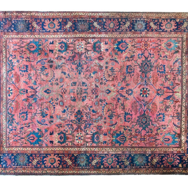 This exceptional early 20th-century Persian Sarouk Farahan rug is a striking example of one of the most sought-after and...