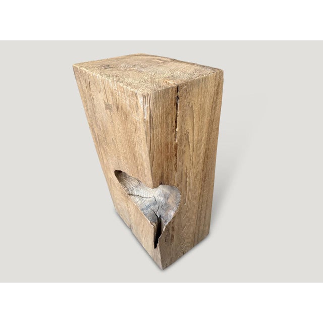 A century old teak block is repurposed into this one of a kind pedestal or side table whilst respecting the natural...