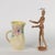 Lenci ceramic pitcher, molded by pouring in shades of yellow with flower decoration. Manufacturing mark under the base....