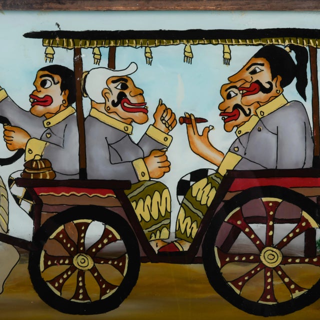 Brimming with humor and movement, this vibrant reverse glass painting captures the iconic Punakawan figures--Semar,...