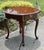 Vintage (1980's) Oval Side Table has a Queen Anne Style. The Wood is CherryWood. The Table has One Drawer w/Brass...
