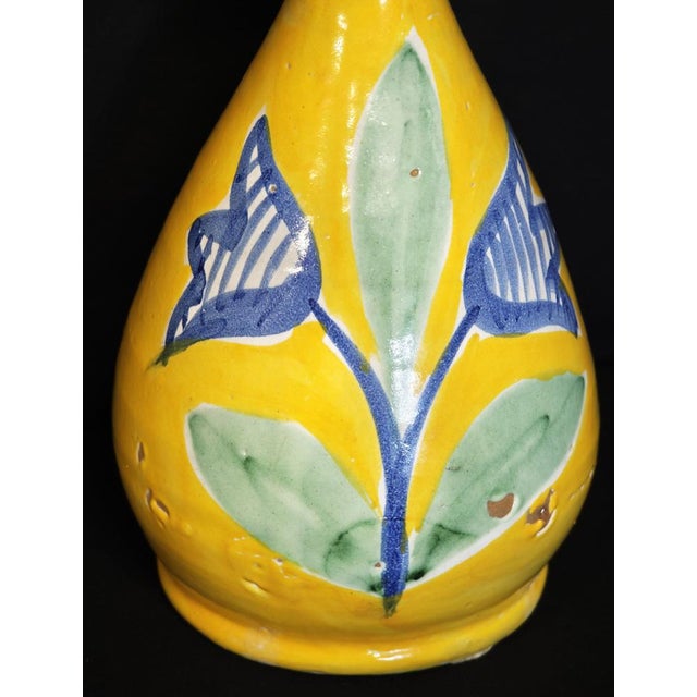 Vietri ceramic vase produced by C.A.S. Vietri, dating back to the 1970s–1980s. Round-shaped with a flared neck, hand-...