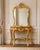 This elegant two-piece console table and matching mirror set dates to the 1970s and reflects the refined symmetry and...