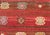 Colorful Red and Brown Striped Turkish Kilim Rug With Geometric Shapes For Sale - Image 11 of 13