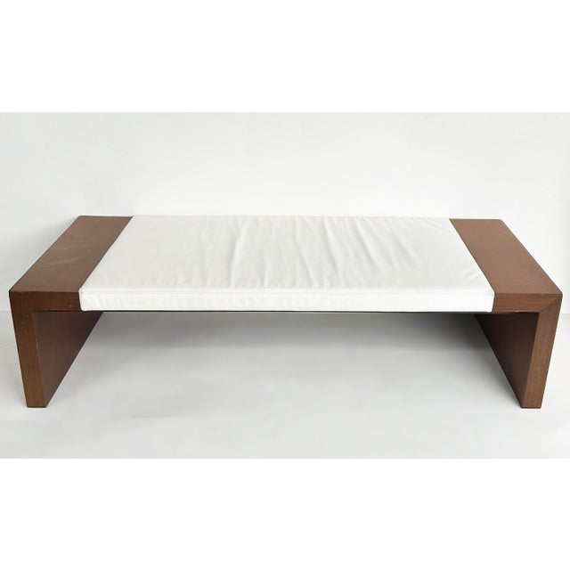 Modern Contemporary Artefacto Leather and Wood Bench Offered for sale is a substantial modern bench with waterfall ends...