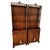 This exceptional pair of antique Chippendale-style étagère cabinets beautifully marries classic English design elements...