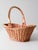 This vintage wicker basket features a softly tapered silhouette, open weave construction, and a wrapped arched handle for...
