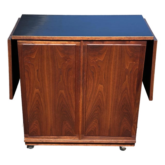 Attributed to Jack Cartwright for Founders Mid-Century Modern Walnut Rolling Buffet Server or Bar Cart, 1960s For Sale