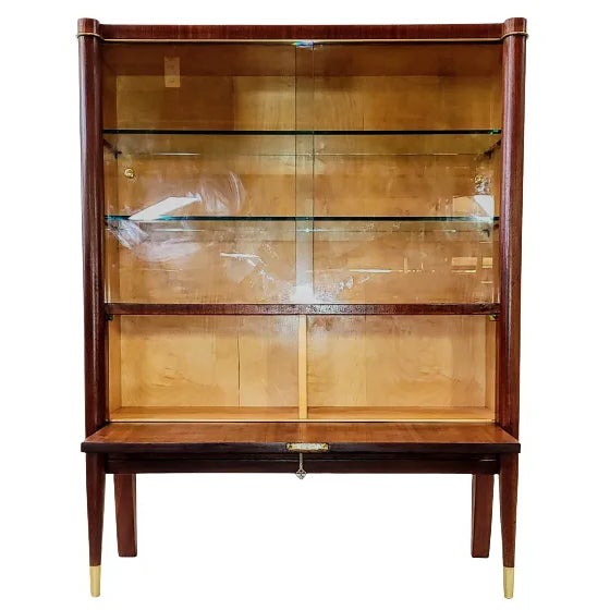 Vintage 1925-1929 Art Deco cocktail vitrine from Belgium is of the "Voltaire" collection by De Coene Freres. The carcass...