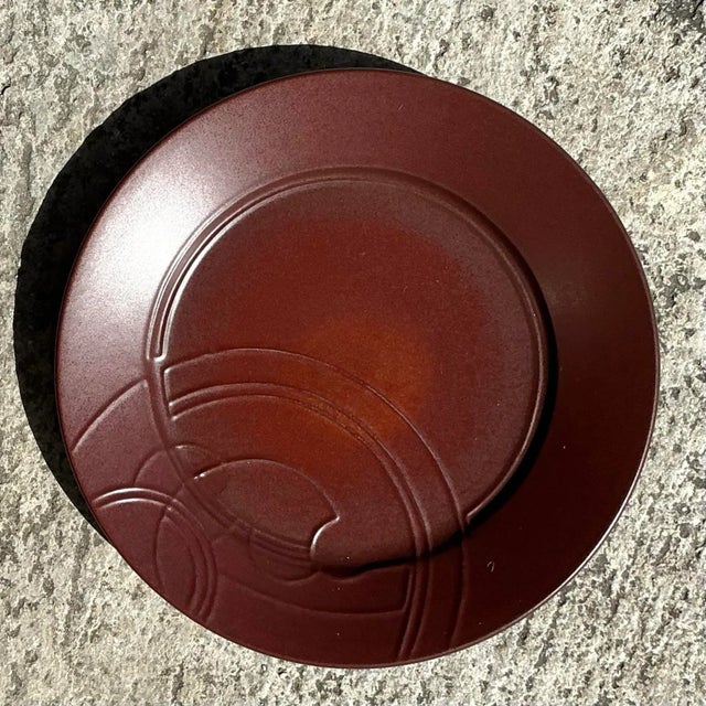 Add a touch of rustic elegance to your decor with this vintage Boho studio pottery plate. With its handcrafted charm and...