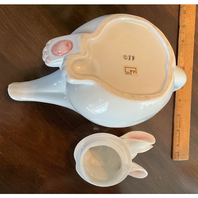 From my mother’s extensive collection! This teapot from Fitz & Floyd features 2 adoring rabbits dancing the tango. It is...
