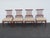 This high quality Set Four Chairs is made out of wood, solid wood, veneer, and upholstery. The chairs were made by Foster...