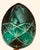 Emerald green cut-glass crystal egg. Dimensions are 3.5" tall by 3" wide. Flat bottom. Excellent condition.