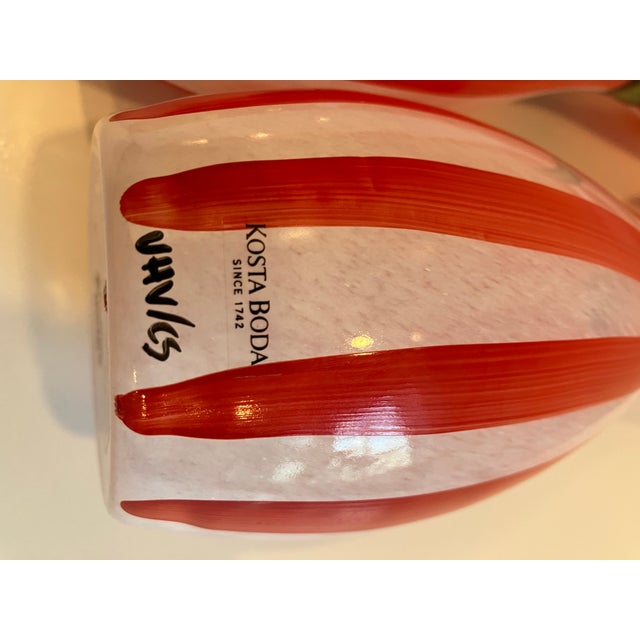 This pair of hand blown glass vases are hand painted They are signed Ulrica. Hyman Vallien Hand crafted in Sweden in the 80’s