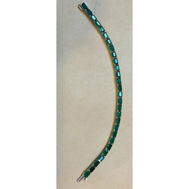 Approximately 25 Ct Natural Emerald Cut Emerald Cocktail Tennis Bracelet 14 Kt White Gold 7.2" This exceptionally...