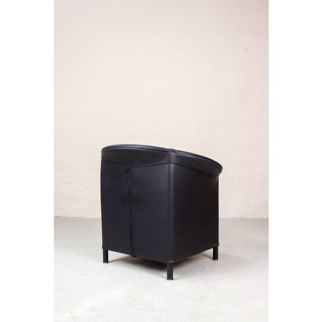 The Aura armchair by Paolo Piva for Wittmann is a compact, comfortable classic that fits well both next to a sofa and as a...
