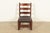 An exceptional antique Mission or Arts & Crafts period ladder back rocking chair By Gustav Stickley (signed with red...