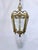 Bronze Lantern With Etched Glass Panels. It has 3 light with candelabra base sockets that each holds a 75W light bulbs or...