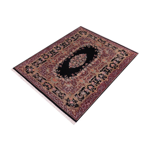 Designed with mesmerizing intricacy and gorgeous color palette, this hand-knotted masterpiece demonstrates the beauty and...