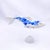This artwork features a delicately crafted fish, rendered in resin cast and adorned with intricate blue patterns that...