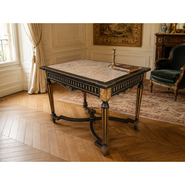 Elegant french napoleon iii center table, dating from the second half of the 19th century, circa 1870-1890, displaying a...