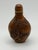 This is a fine example of contemporary snuff bottles. It is carved out of box wood and decorated with raised detailed...