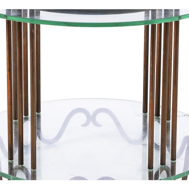 Side table. Portuguese style; 20th century, with a metal frame and two glass tops. Defect in one of the tops. Dimensions:...